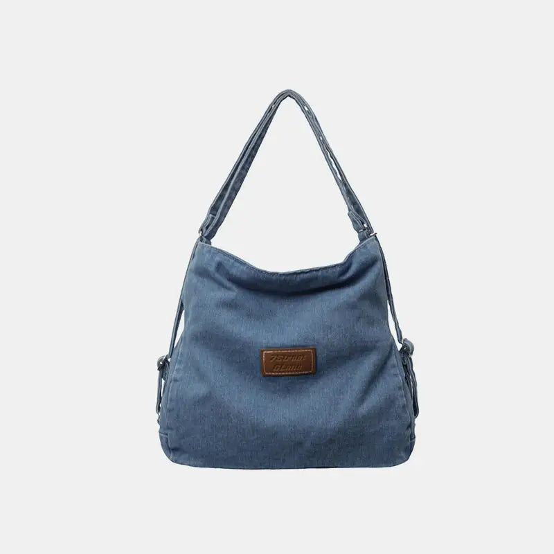 Elevate your style with the adjustable strap denim shoulder bag $29.99 bag medium denim imported product length 13 in,