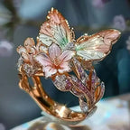 Aesthetic Flower Butterfly Rings featuring gold-tone metal with pink and green enamel butterfly wings and flower accents with rhinestones