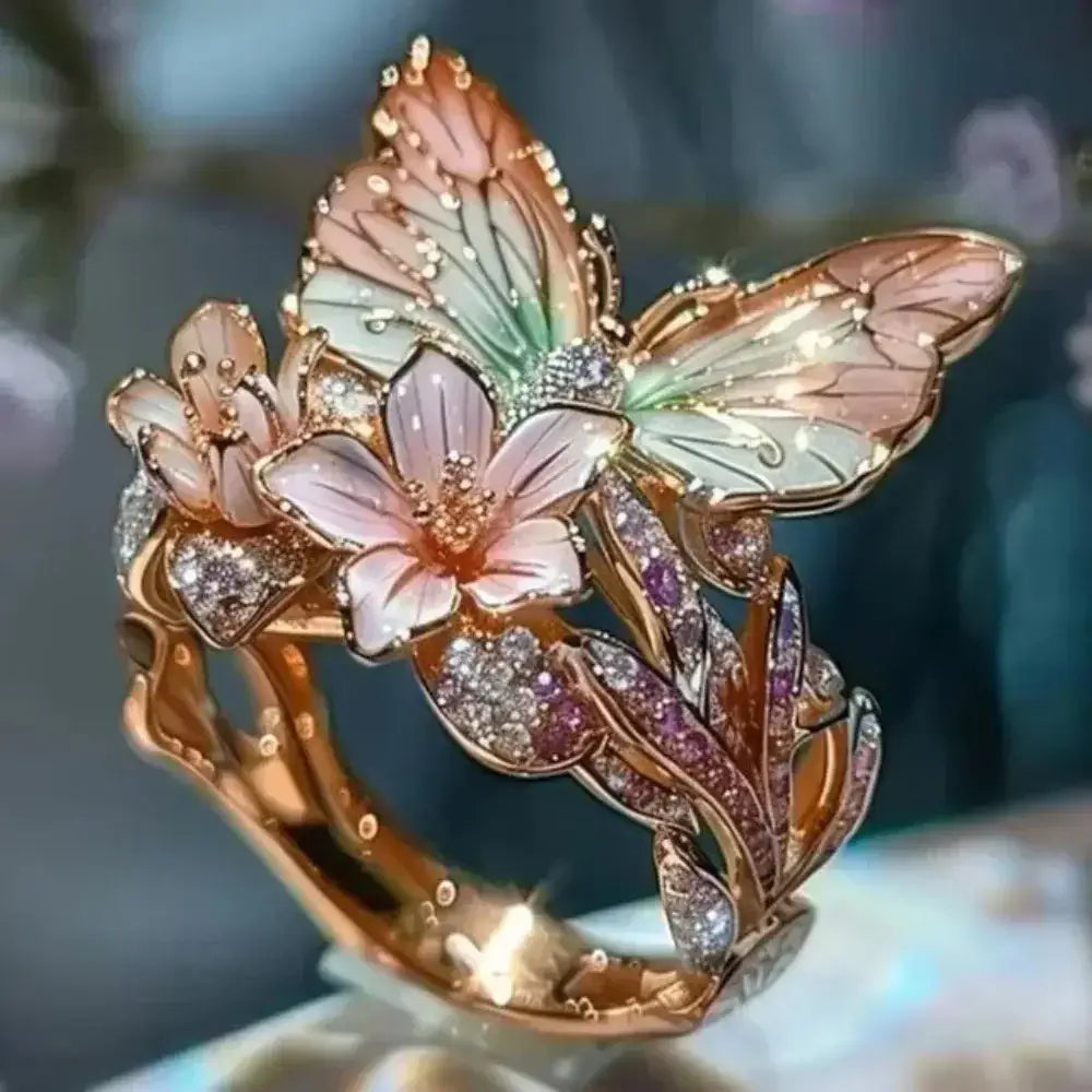 Gold adjustable metal ring with colorful pastel enamel butterfly and flower designs featuring rhinestone accents, Aesthetic Flower Butterfly Rings