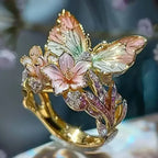 Gold-tone metal Aesthetic Flower Butterfly Rings featuring pastel gradient enamel butterfly and pink flower with rhinestone accents