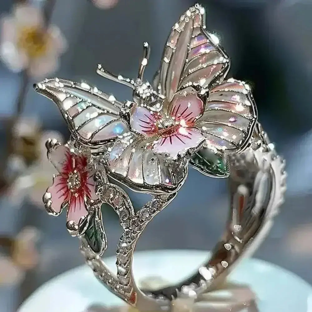 Aesthetic Flower Butterfly Rings featuring a silver-toned metal butterfly and pink flower accents with rhinestone details and an adjustable band