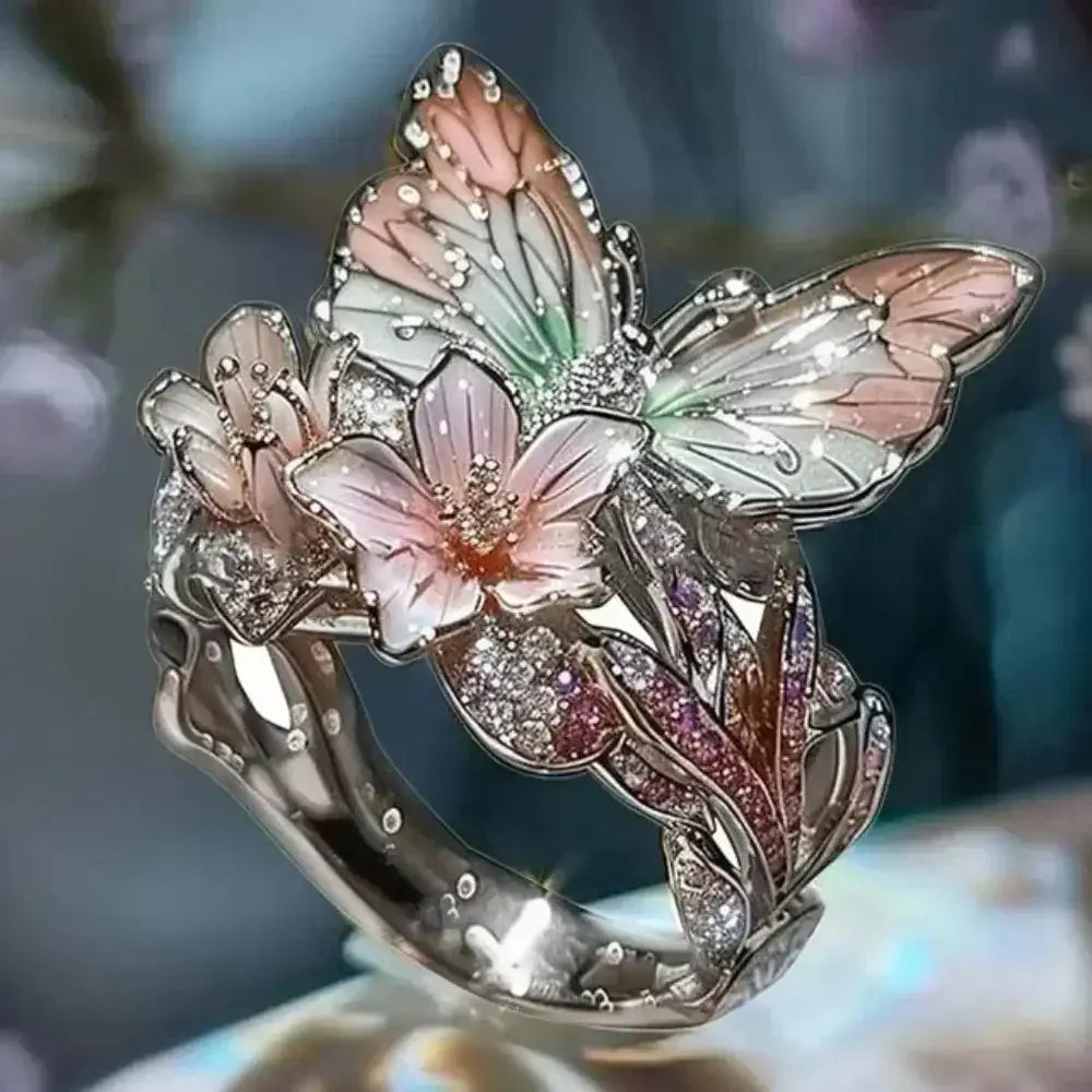 Aesthetic Flower Butterfly Rings featuring silver metal with enamel pink and green floral and butterfly designs, adorned with rhinestones