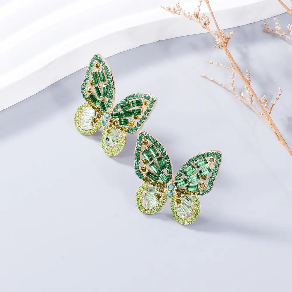 Elevate your style with exclusive rhinestone butterfly earrings for women $7.99 1-pair alloy, rhinestone for a touch