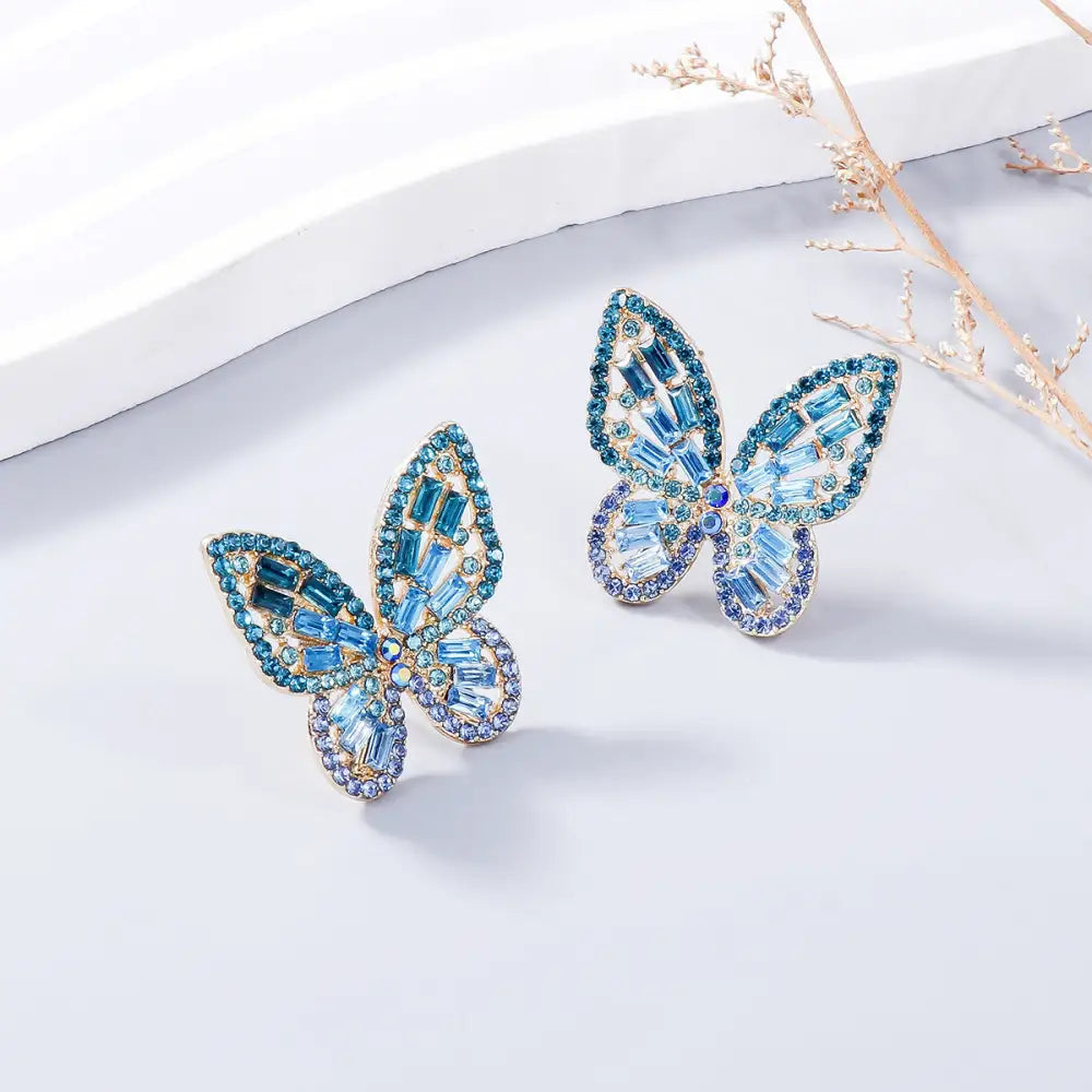 Elevate your style with exclusive rhinestone butterfly earrings for women $7.99 1-pair alloy, rhinestone for a touch