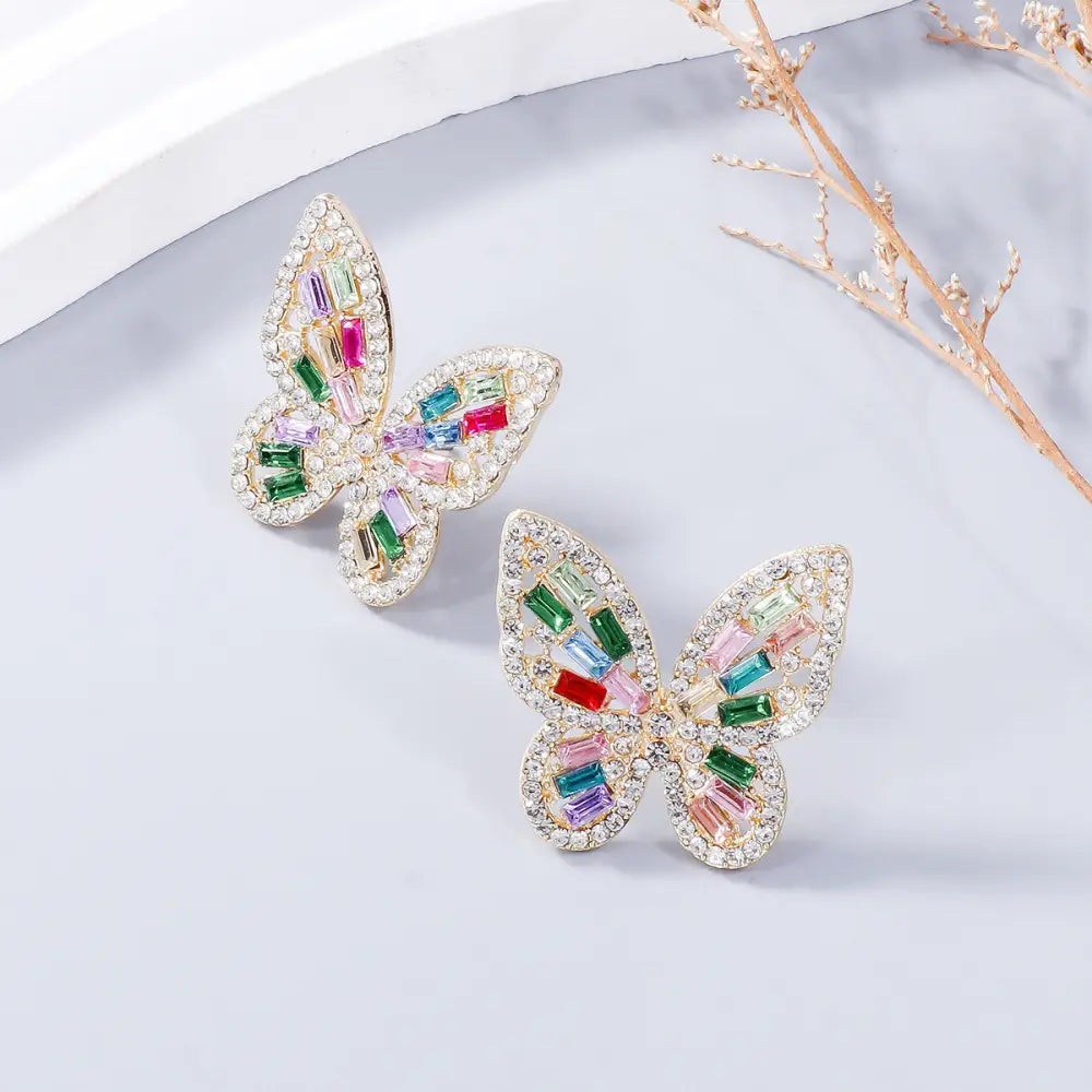 Elevate your style with exclusive rhinestone butterfly earrings for women $7.99 1-pair alloy, rhinestone for a touch