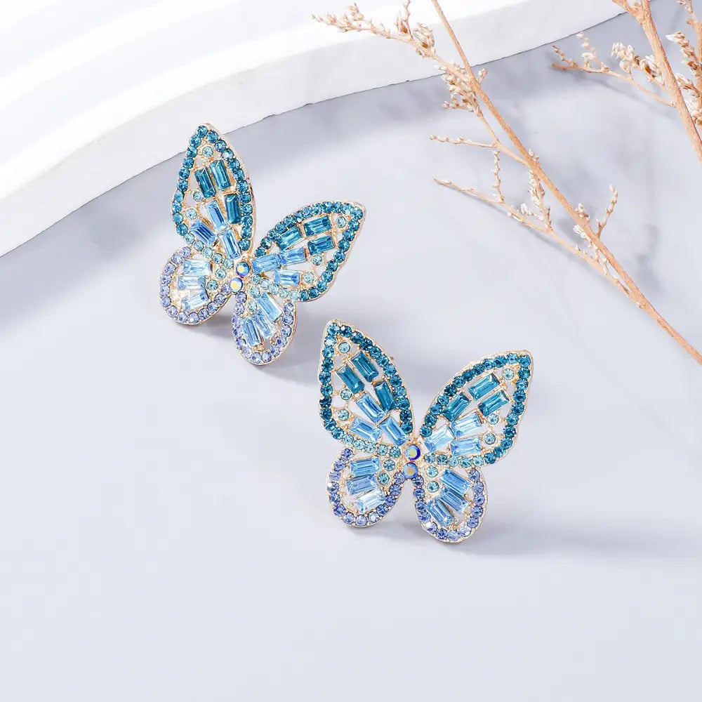 Elevate your style with exclusive rhinestone butterfly earrings for women $7.99 1-pair alloy, rhinestone for a touch