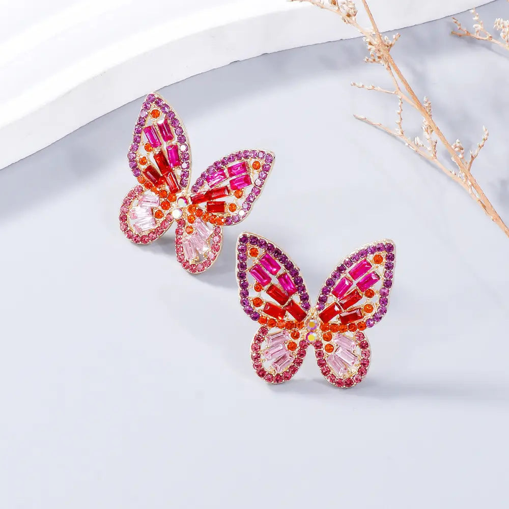 Elevate your style with exclusive rhinestone butterfly earrings for women $7.99 1-pair alloy, rhinestone for a touch