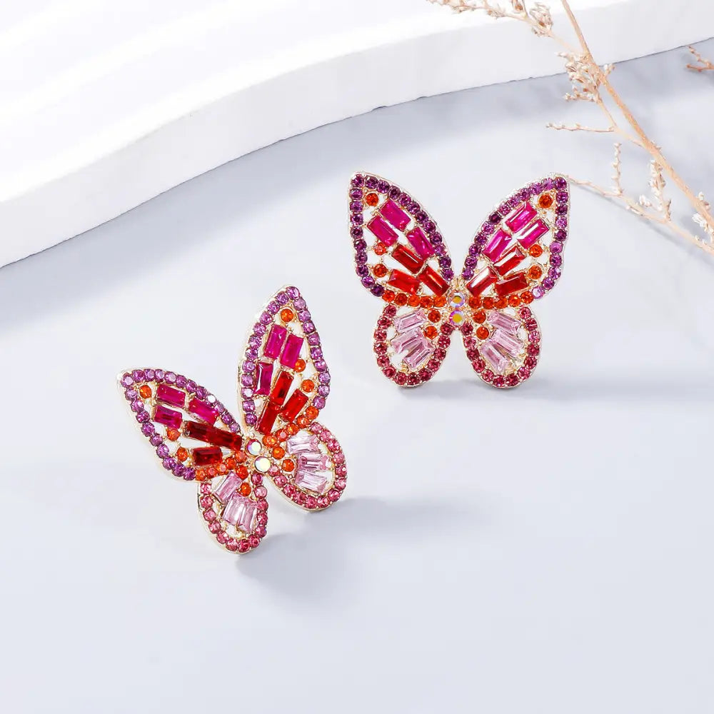 Elevate your style with exclusive rhinestone butterfly earrings for women $7.99 1-pair alloy, rhinestone for a touch