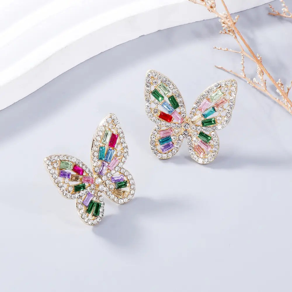 Elevate your style with exclusive rhinestone butterfly earrings for women $7.99 1-pair alloy, rhinestone for a touch