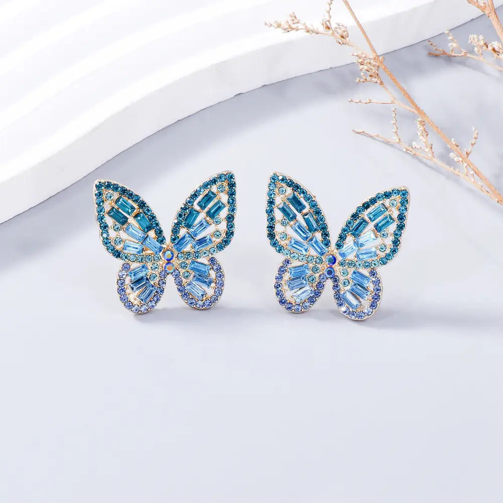 Elevate your style with exclusive rhinestone butterfly earrings for women $7.99 1-pair alloy, rhinestone for a touch