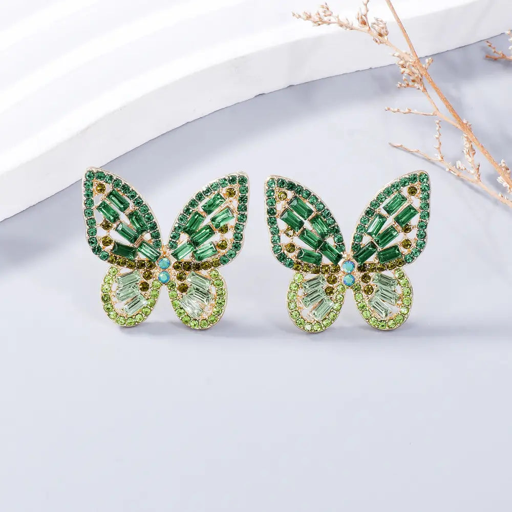 Elevate your style with exclusive rhinestone butterfly earrings for women $7.99 1-pair alloy, rhinestone for a touch