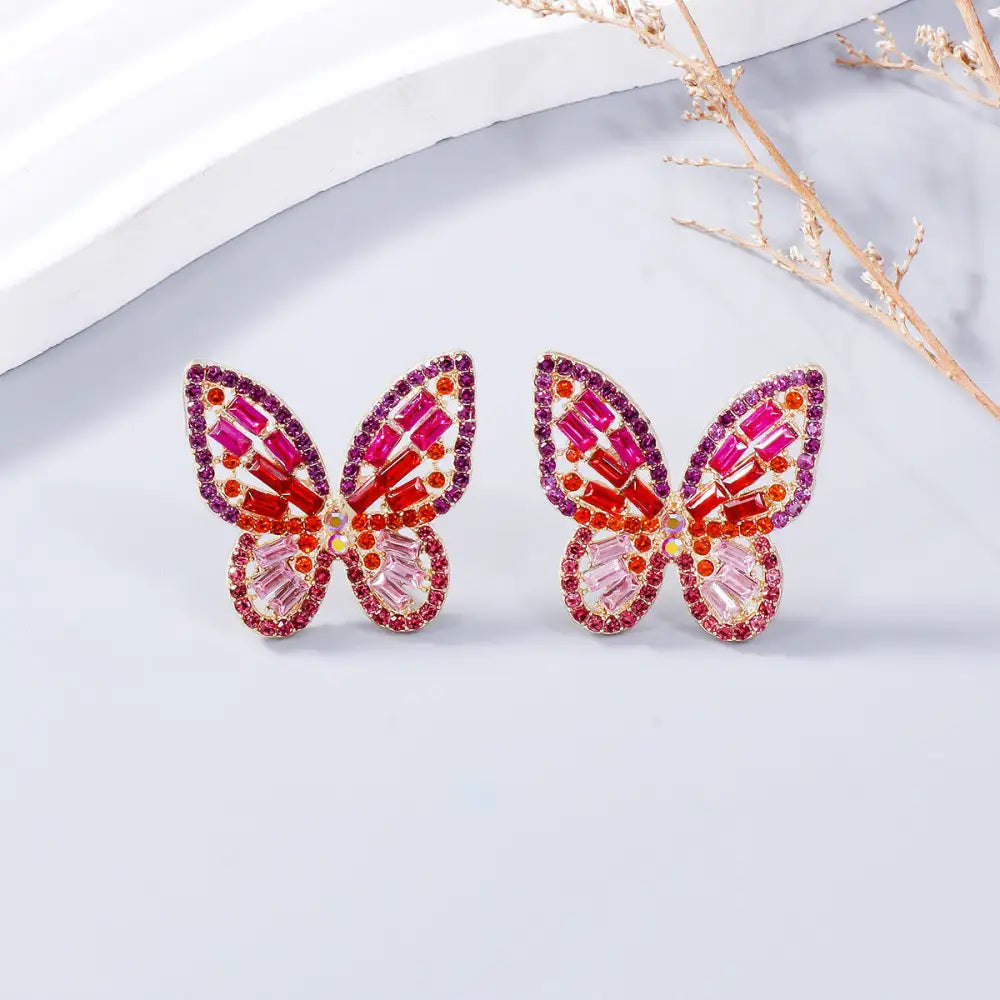 Elevate your style with exclusive rhinestone butterfly earrings for women $7.99 1-pair alloy, rhinestone for a touch