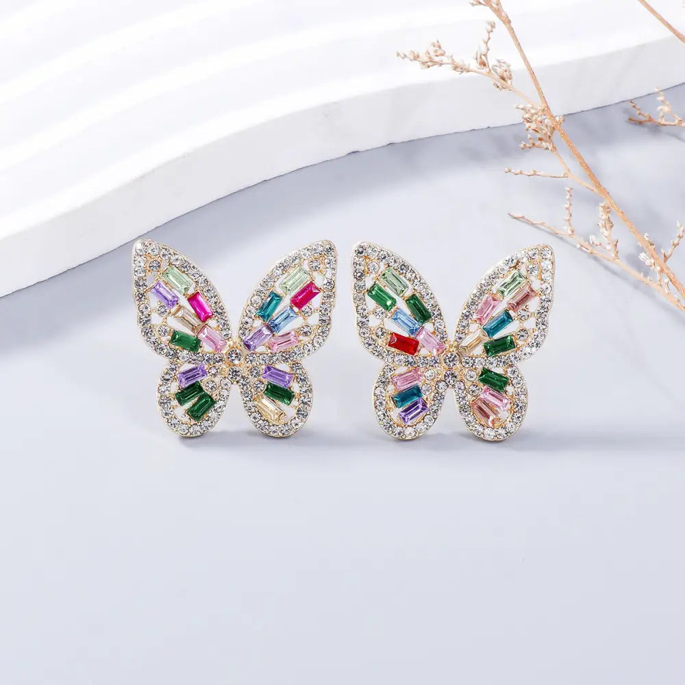 Elevate your style with exclusive rhinestone butterfly earrings for women $7.99 1-pair alloy, rhinestone for a touch