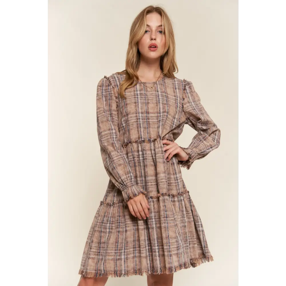 Embrace timeless designer clothing with the and the why frayed tiered dress $65.99 the washed frayed tiered plaid dress