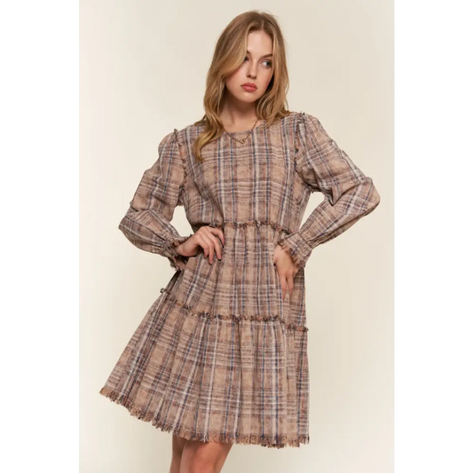 Embrace timeless designer clothing with the and the why frayed tiered dress $65.99 the washed frayed tiered plaid dress