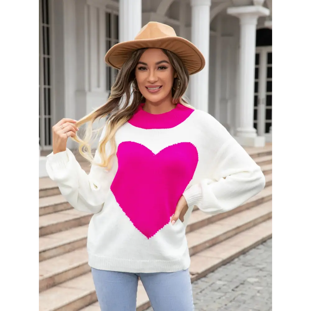 Angel wings heart graphic sweater in luxury fashion for women $28.99 embrace the allure of basic style, effortlessly