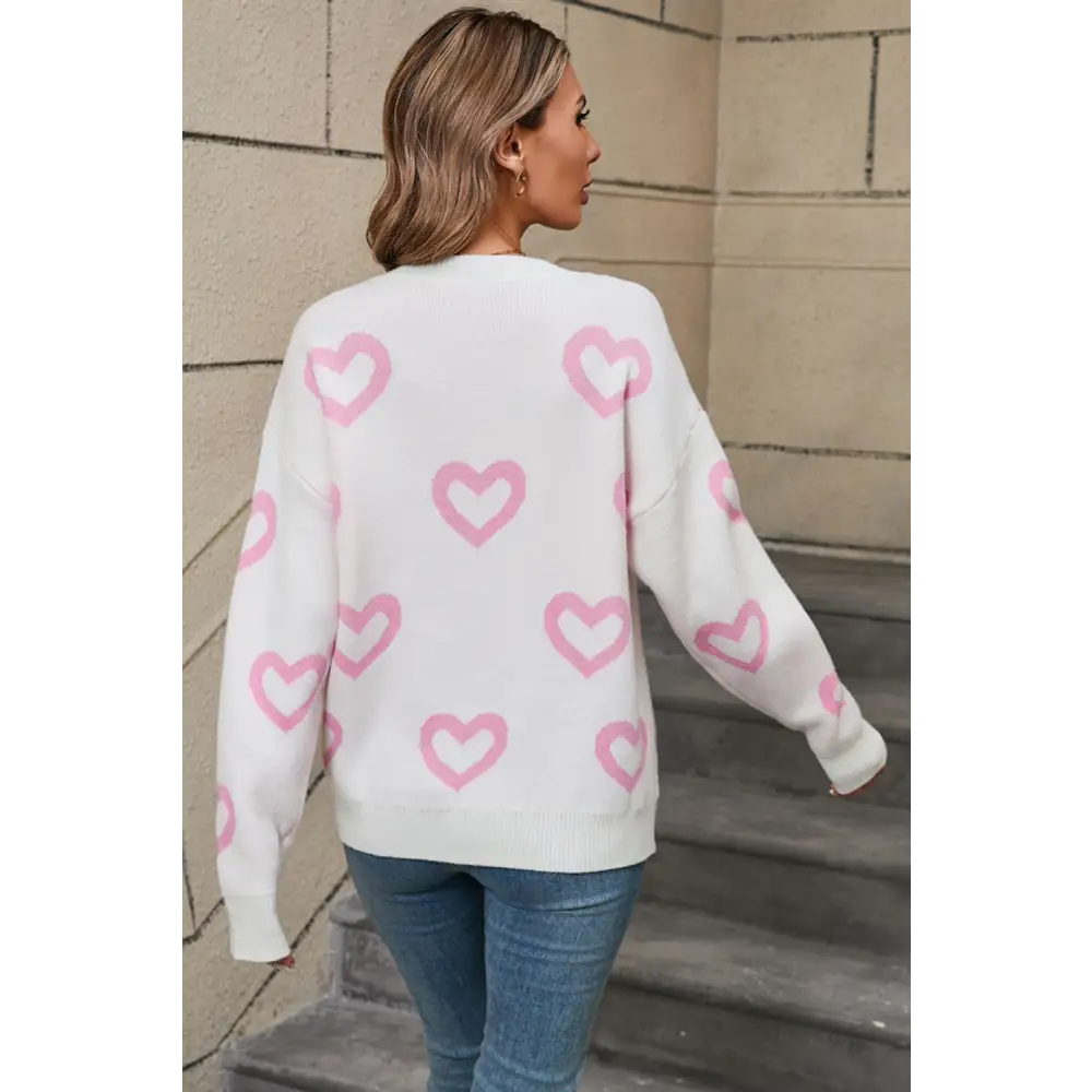 Elevate your wardrobe with the angel wings heart sweater in luxury fashion for woman $34.99 experience a chic