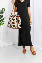 Animal Print Plush medium hand bag with brown and white leopard pattern, top handle straps, and plush material