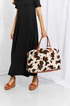 Animal Print Plush weekender bag in medium size with brown and cream leopard pattern, fluff material, and top handle straps