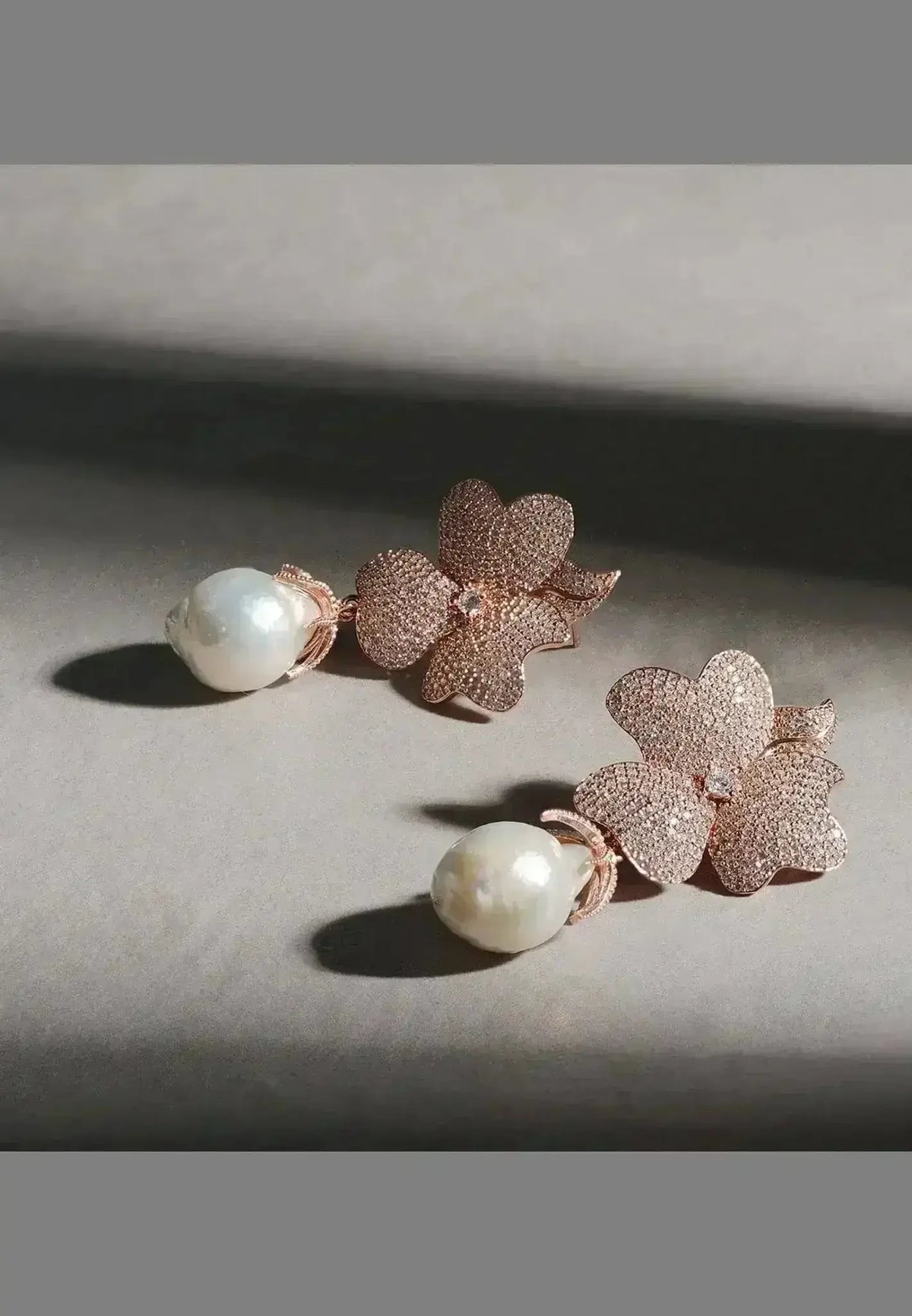 Baroque Pearl Flower Drop Earrings featuring rose gold textured floral motifs with white baroque pearl drops for elegant style