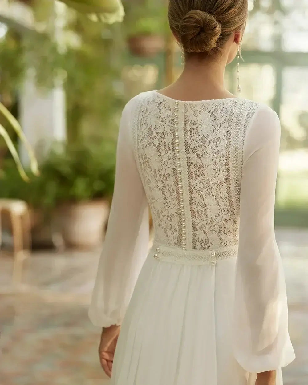 Beach Wedding Dress featuring delicate long lace sleeves and intricate pearl details on a lightweight white fabric back panel