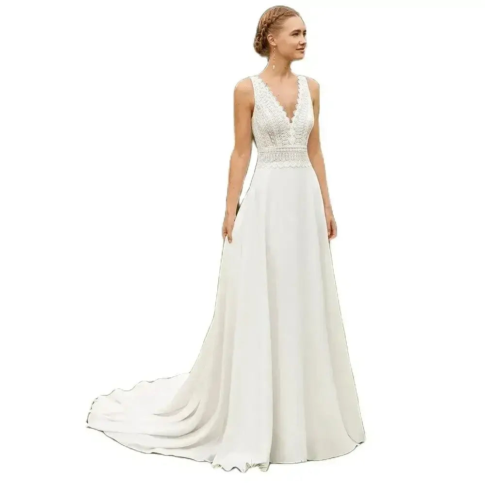 Beach Wedding Dress in white lightweight polyester with lace bodice, V-neckline, and flowing court train silhouette