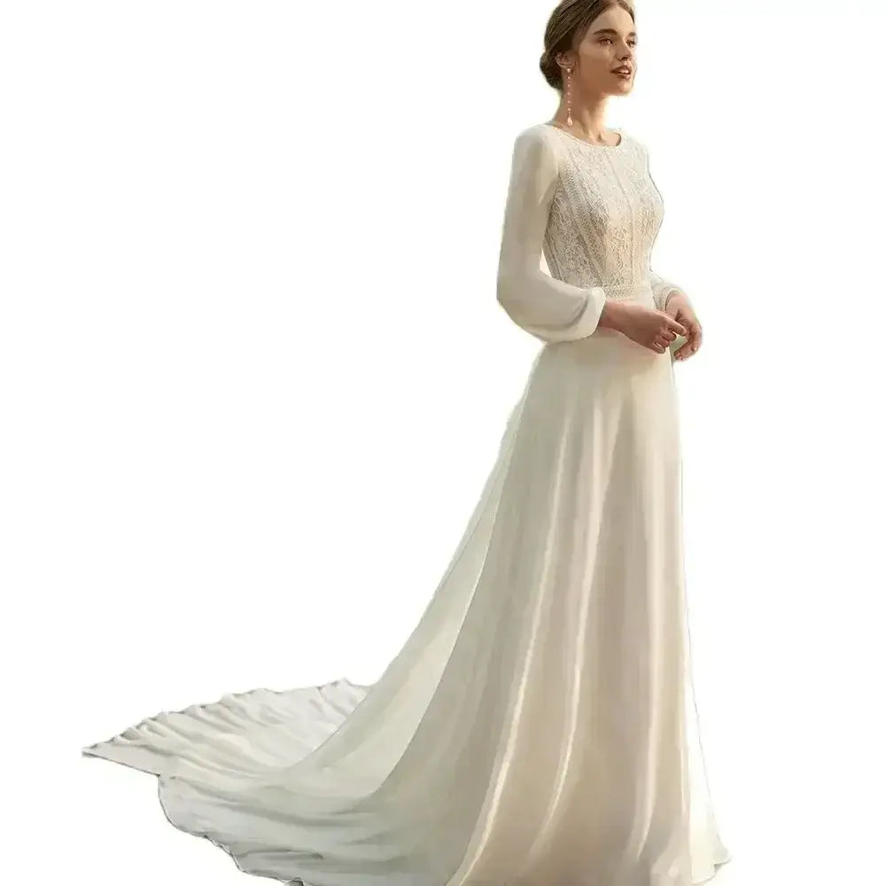 Beach Wedding Dress white long sleeve lace gown with elegant round neckline and flowing court train