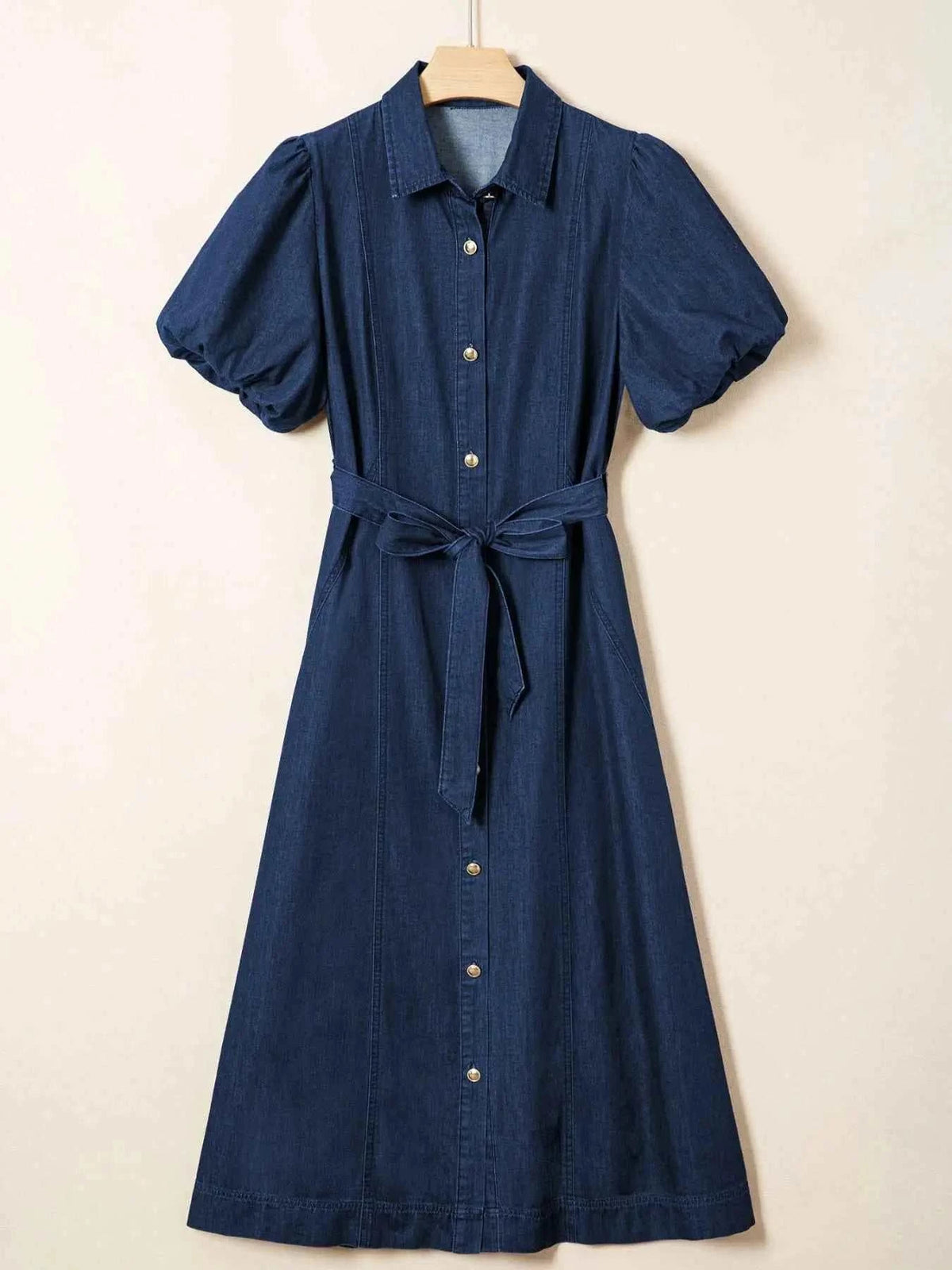 Belted Button-Down midi denim dress in dark blue 100% cotton with puff sleeves, front buttons, and tied waist belt