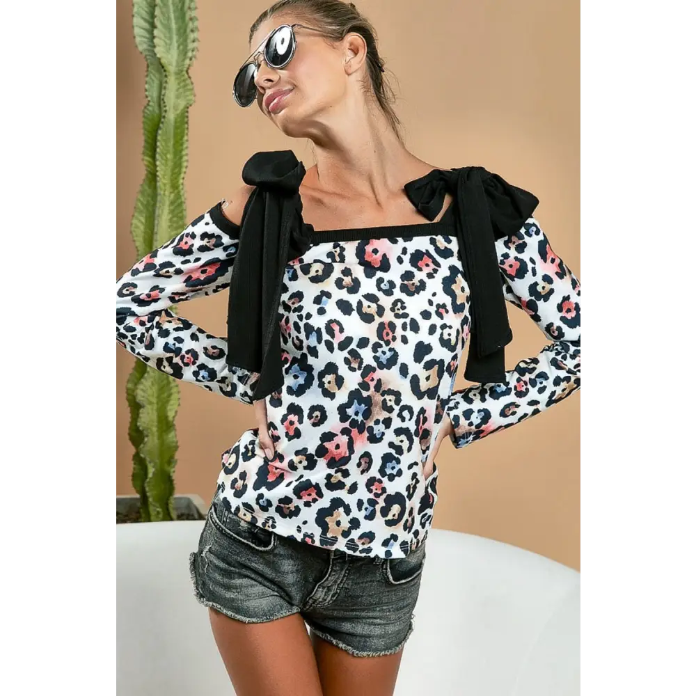 Elegant leopard shoulder tie top in luxury fashion for women $38.26 the leopard shoulder tie long sleeve top is a chic