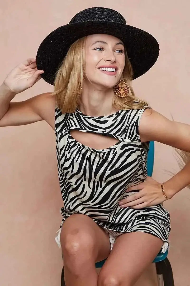 BiBi Zebra Printed Rib sleeveless top with black and white zebra pattern, ribbed texture, and a cut out front detail
