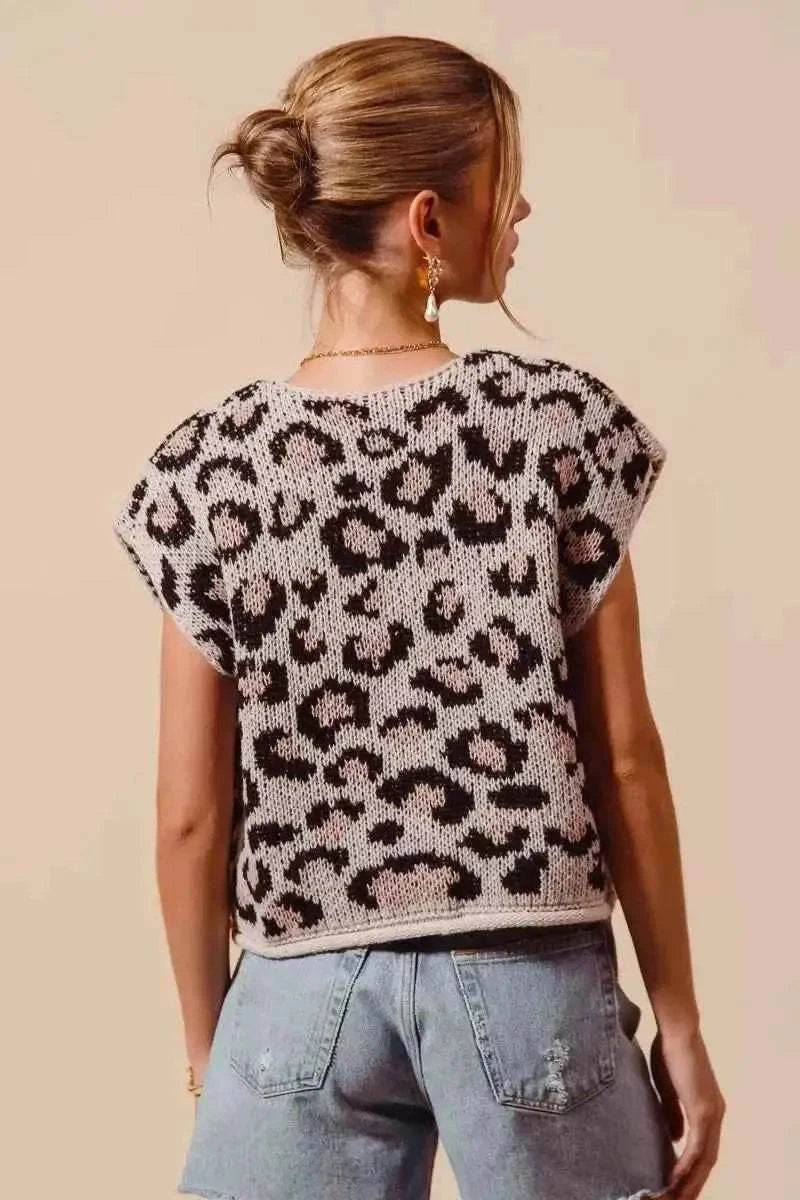 Leopard print knit sweater vest top in beige and dark brown, featuring a Big Metal Button front and a slightly stretchy fit