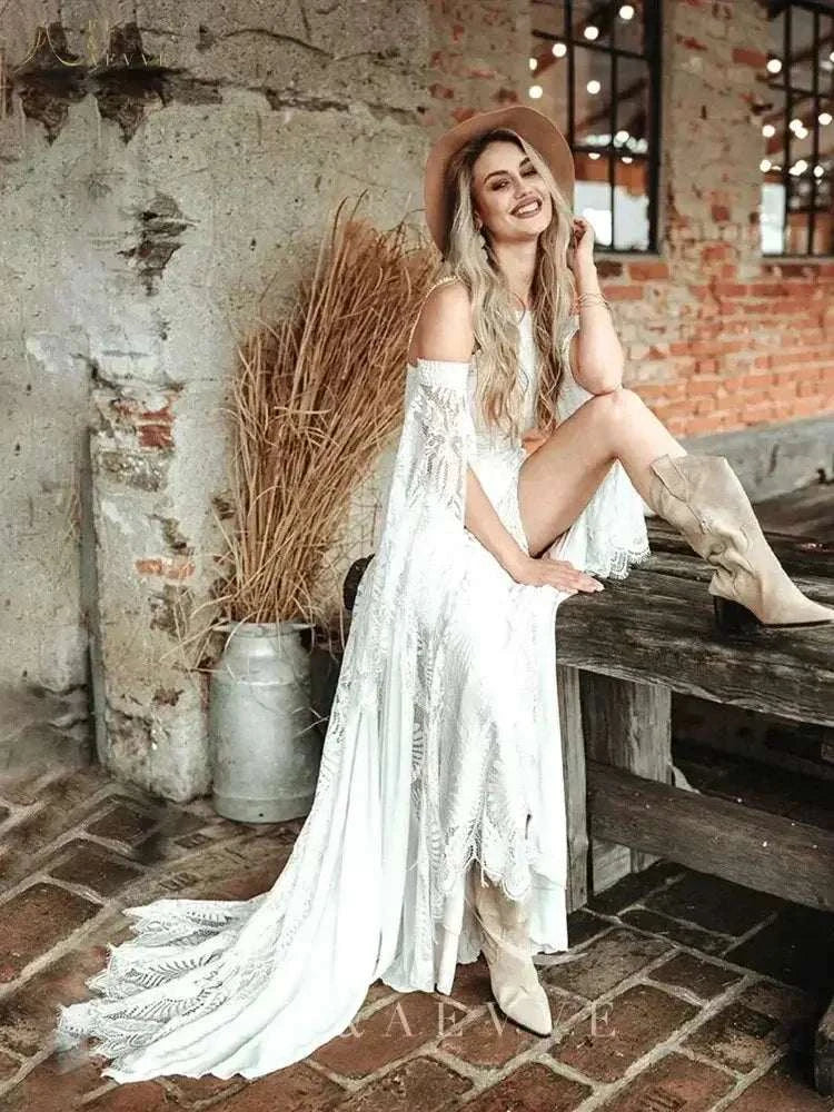 Bohemian Chic Civil Bridal Dress in white lace with off-shoulder design, flare sleeves, crochet pattern, and floor-length slit
