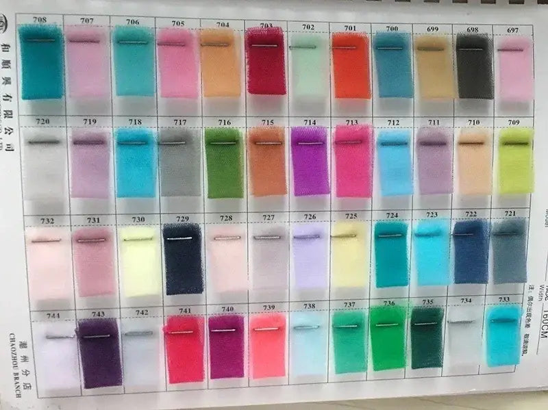 Fabric color swatch chart displaying diverse fabric samples in pastel and vibrant shades for Bohemian Mermaid Wedding Dress customization