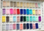 fabric swatches in various pastel and bright colors arranged in a grid showing different shades of textile samples