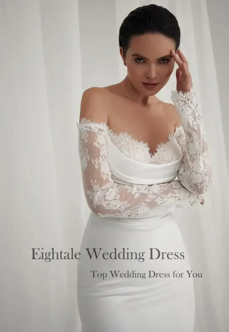 Bohemian Mermaid Wedding Dress featuring white lace long sleeves, off-shoulder sweetheart neckline, and fitted mermaid silhouette