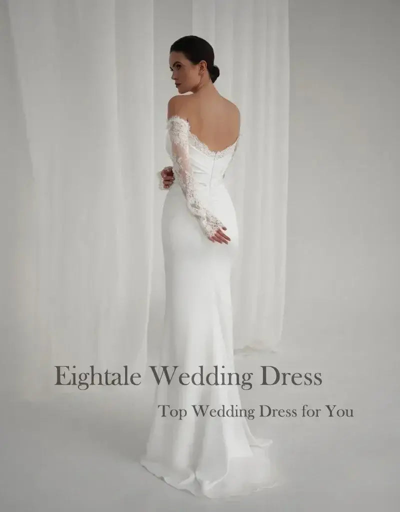 Bohemian Mermaid Wedding Dress in white featuring off-shoulder lace sleeves and a fitted mermaid silhouette with sweep train