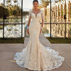 Boho Mermaid Wedding Dress in ivory with sheer long lace sleeves, intricate floral appliques, and a dramatic court train