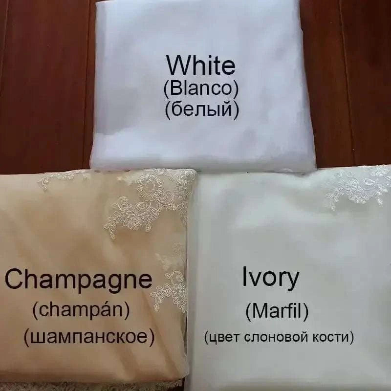 Wedding dress fabric samples in white, champagne, and ivory colors with lace detailing for Boho Mermaid Wedding gowns