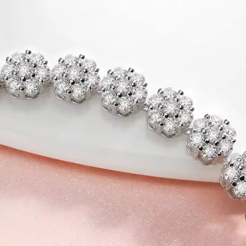 Brilliant Flower Created Moissanite Tennis Bracelet with flower-cut clear stones set in 14K white gold overlay on sterling silver