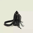 Small black Butterfly Decor Flap crossbody bag made of PU leather with adjustable strap and decorative tassels
