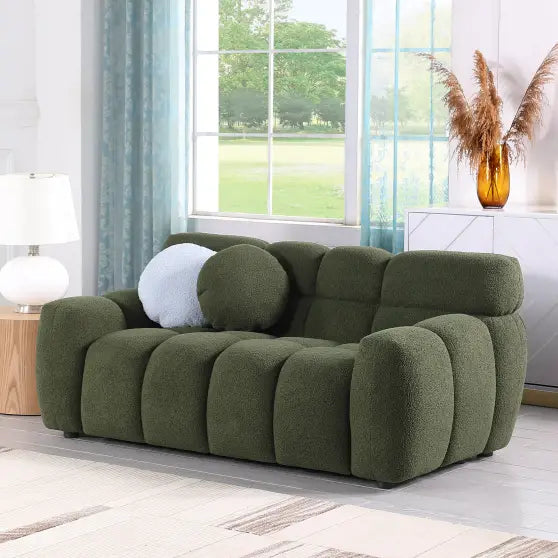 Elegant green boucle sofa for luxury fashion in living spaces