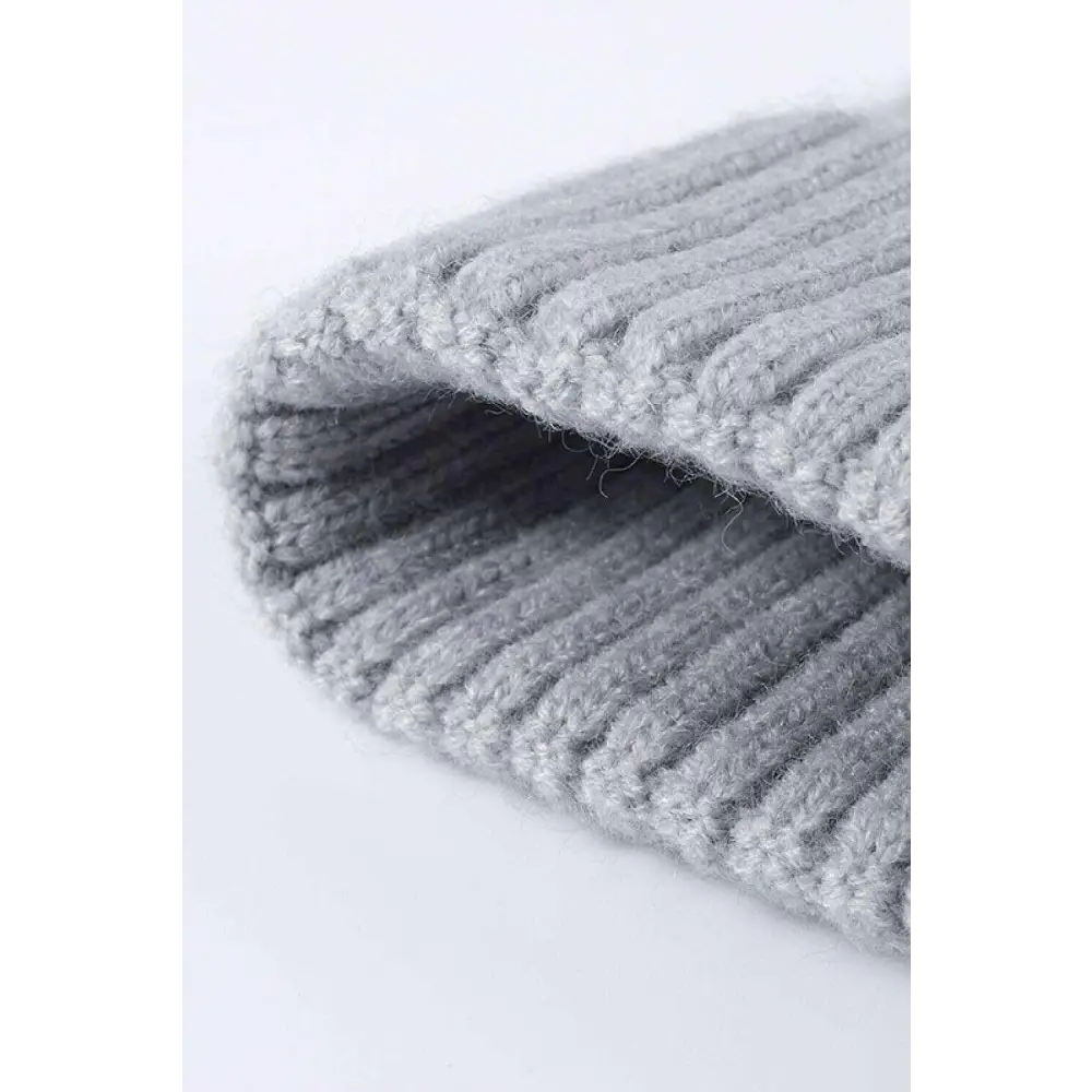 Luxury cable-knit cuff beanie for timeless winter chic $11 picture flat lay beanie pattern solid 40% acrylic, 32%