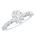 Carat IGI Certified Oval Diamond solitaire engagement ring with a large oval center stone and smaller marquise and round side stones on a white metal band