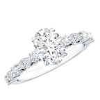 Carat IGI Certified Oval Diamond solitaire engagement ring with a large oval center stone and smaller marquise and round side stones on a white metal band