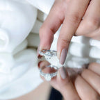 Carat IGI Certified Oval Diamond solitaire engagement ring in white gold with a central oval diamond and side stones on the band