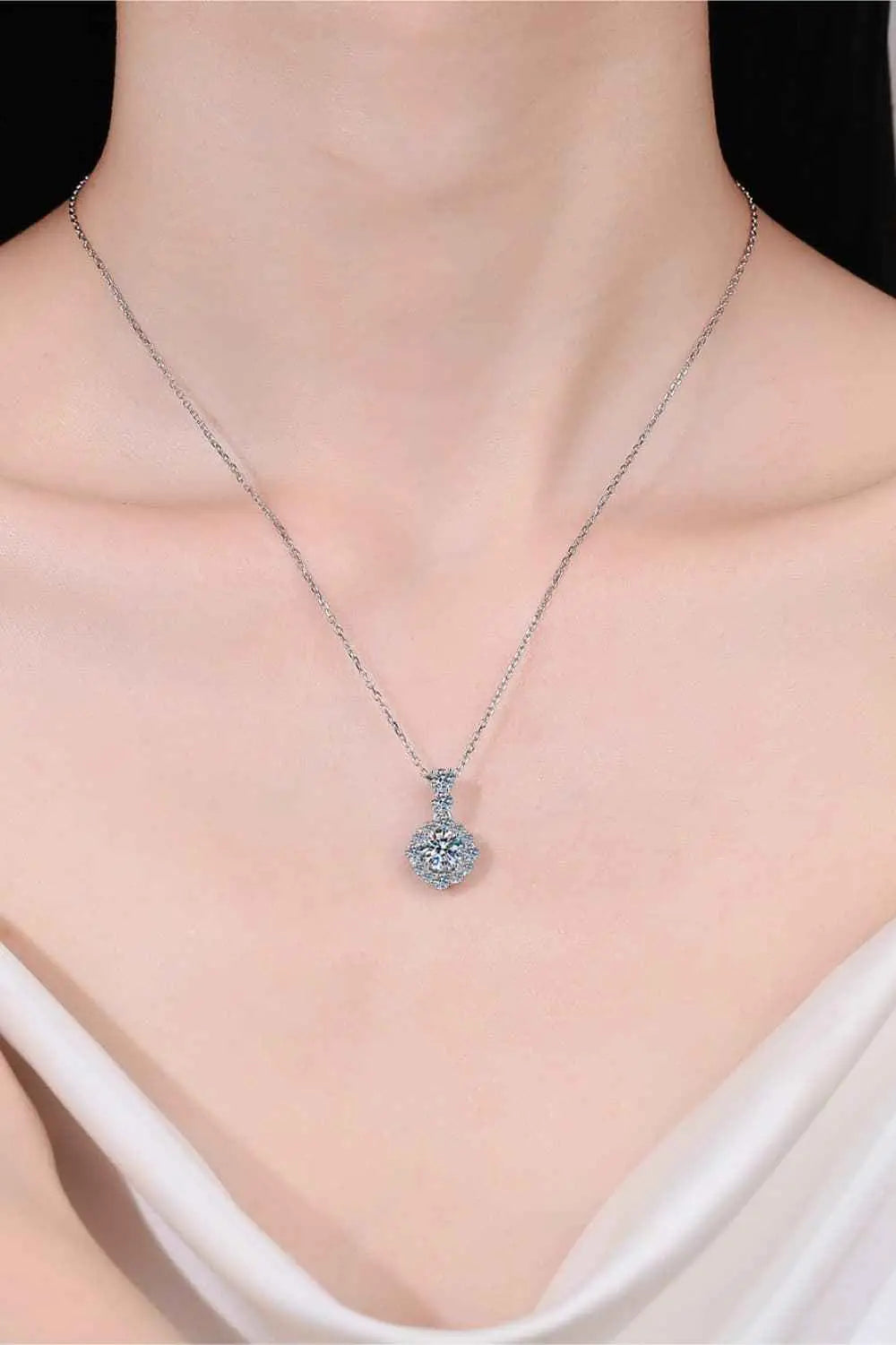 Delicate 925 sterling silver necklace with a sparkling round Carat Moissanite pendant and zircon accent stones