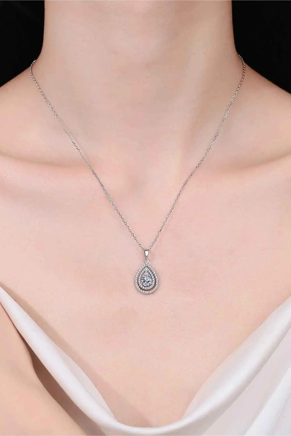Carat Moissanite Teardrop Pendant sparkling silver necklace with teardrop-shaped moissanite and zircon accent stones on delicate chain