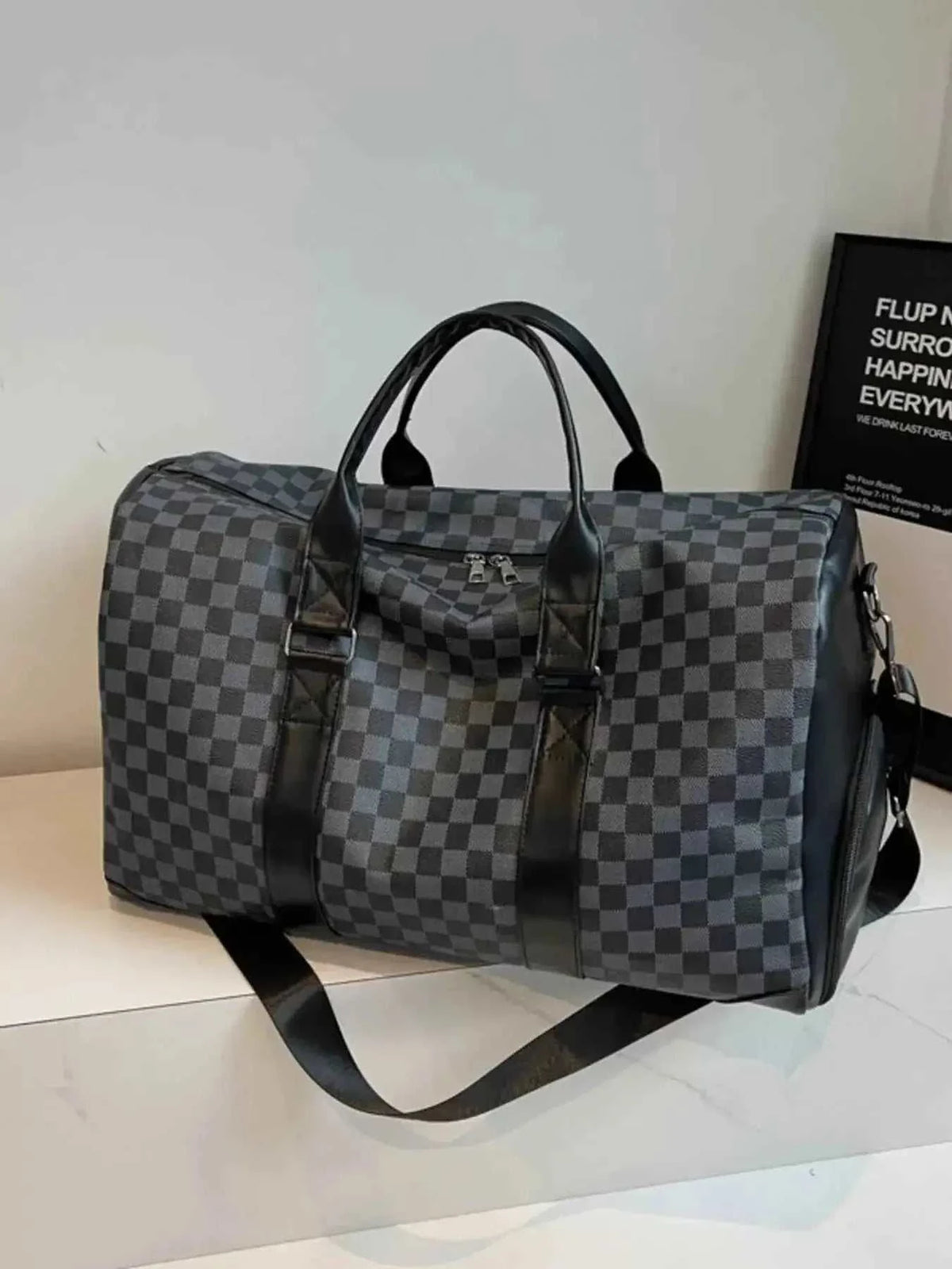 Checkered Pattern Travel Bag in black and gray PU leather with dual handles and detachable shoulder strap