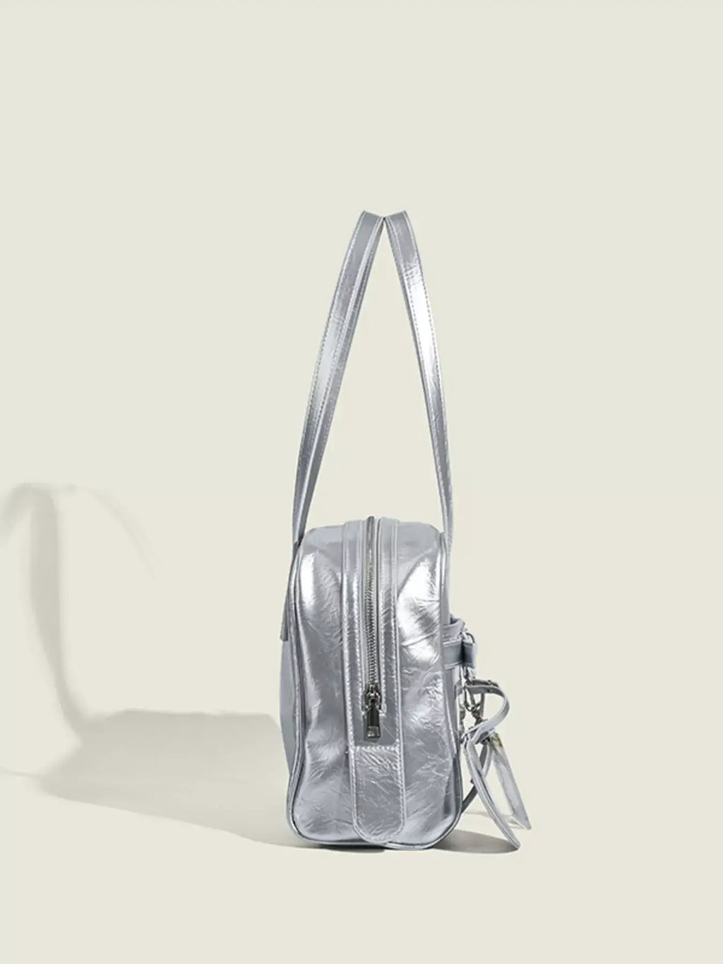 Clear Window Shoulder Bag in metallic silver PU leather with a sleek, rectangular shape and double shoulder straps.