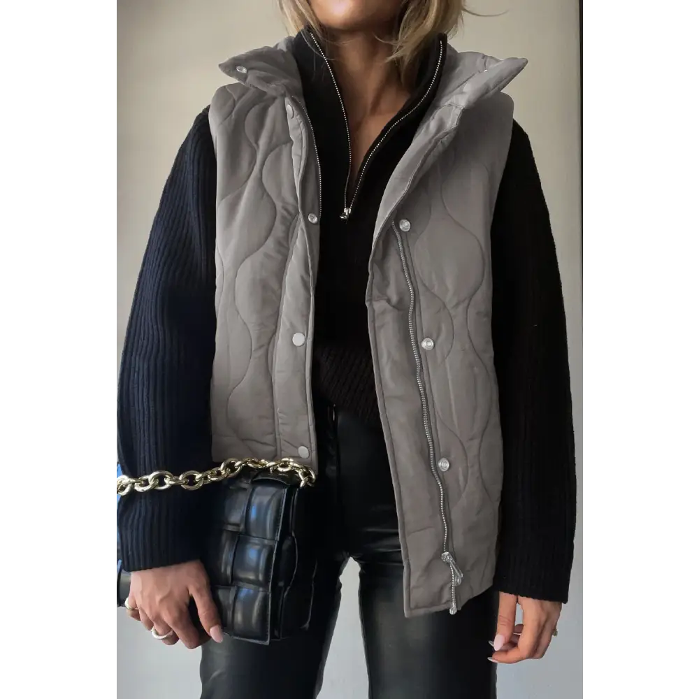 Elevate your style with the timeless collared neck vest and pockets $42.99 pocketed for ultimate convenience and style,